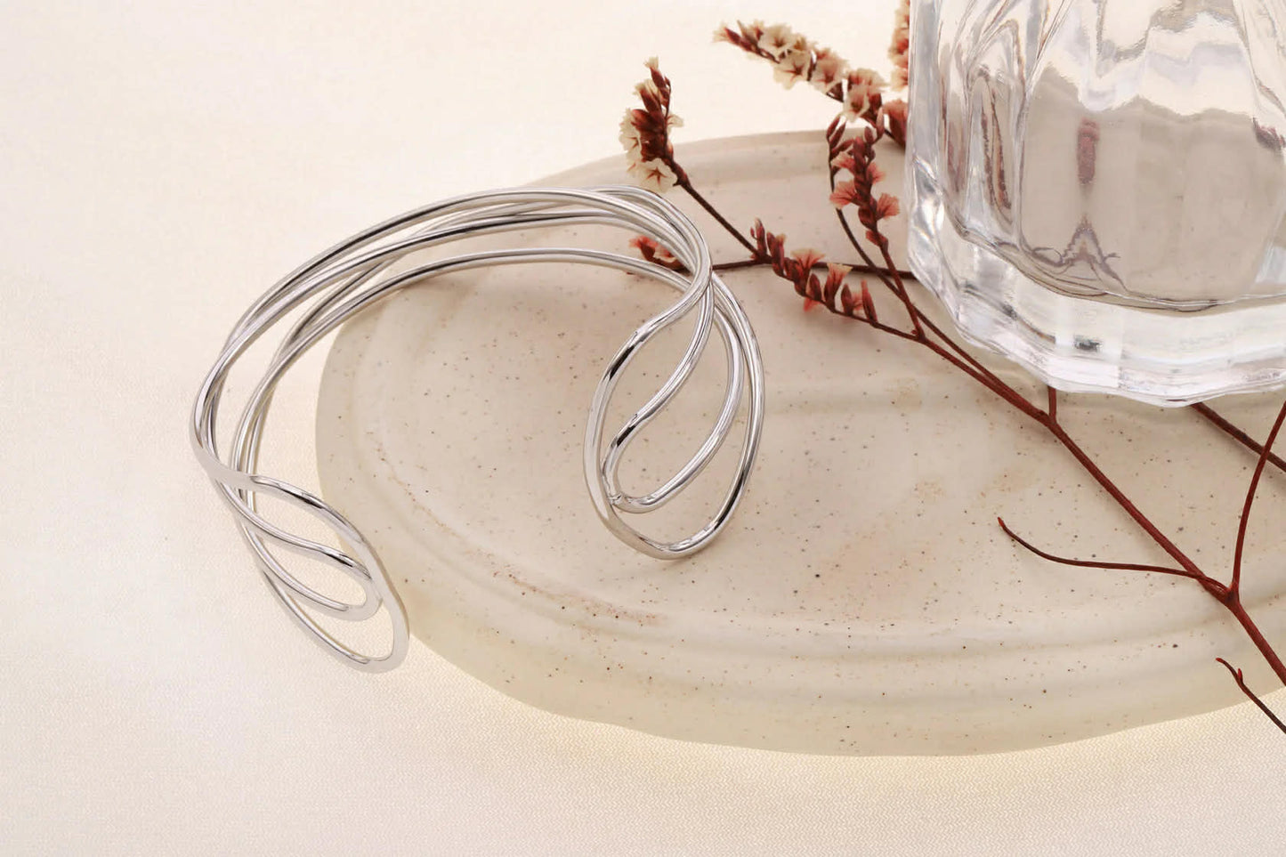 Bracelet manchette argentée ajustable 4 branches entrelacées